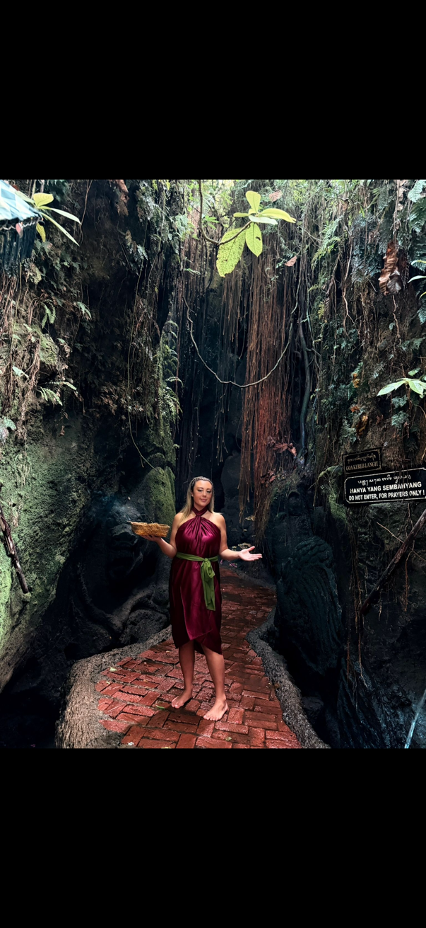 Customer at a jungle waterfall in Bali
