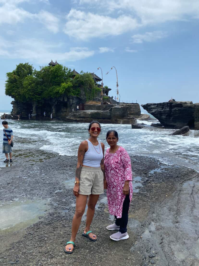 Couple at a Bali beach viewpoint