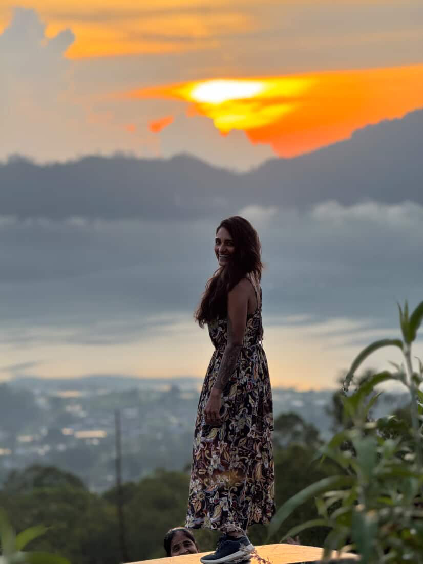 Guest overlooking a Bali sunset mountain view